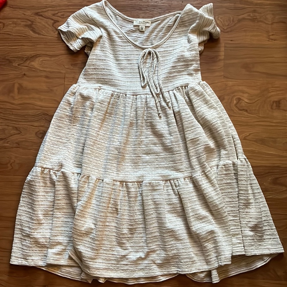 See you Monday cream and white dress